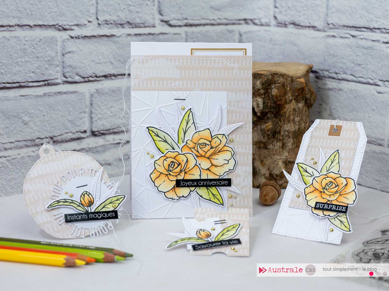 Création d'un ensemble cadeau pour anniversaire composé d'une carte et d'étiquettes cadeaux avec fleurs mises en couleurs aux crayons caran d'ache supracolor aquarellable.